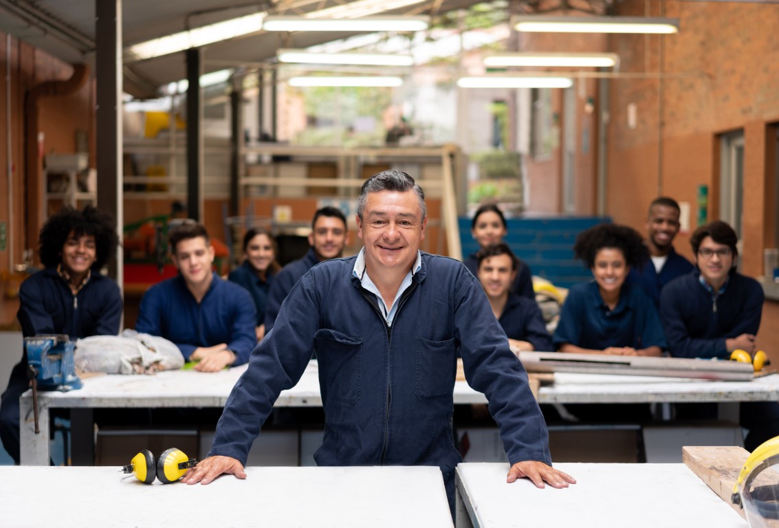 Teacher with group of students during In2Learning training